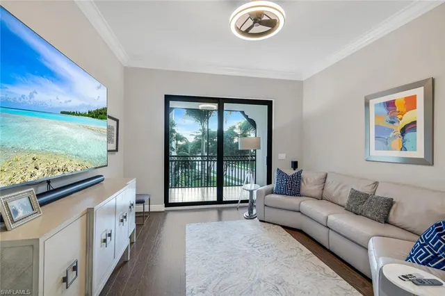 a view of empty room with windows and entryway