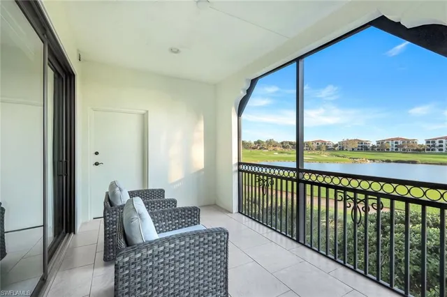 a bathroom with a toilet a sink a mirror a shower a vanity and window