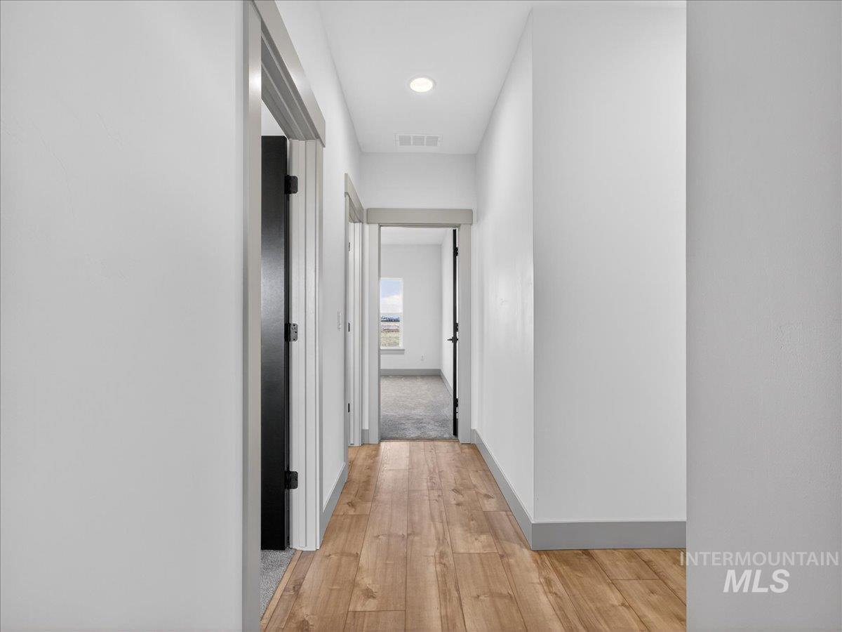 2240 Little Rock Road Emmett, ID 83617 - Photo 37 of 50 Hall featuring light wood-type flooring and recessed lighting