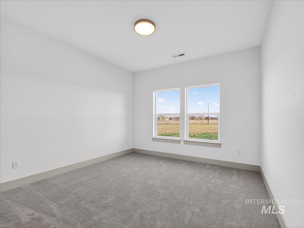 2240 Little Rock Road Emmett, ID 83617 - Photo 38 of 50 Carpeted empty room with baseboards