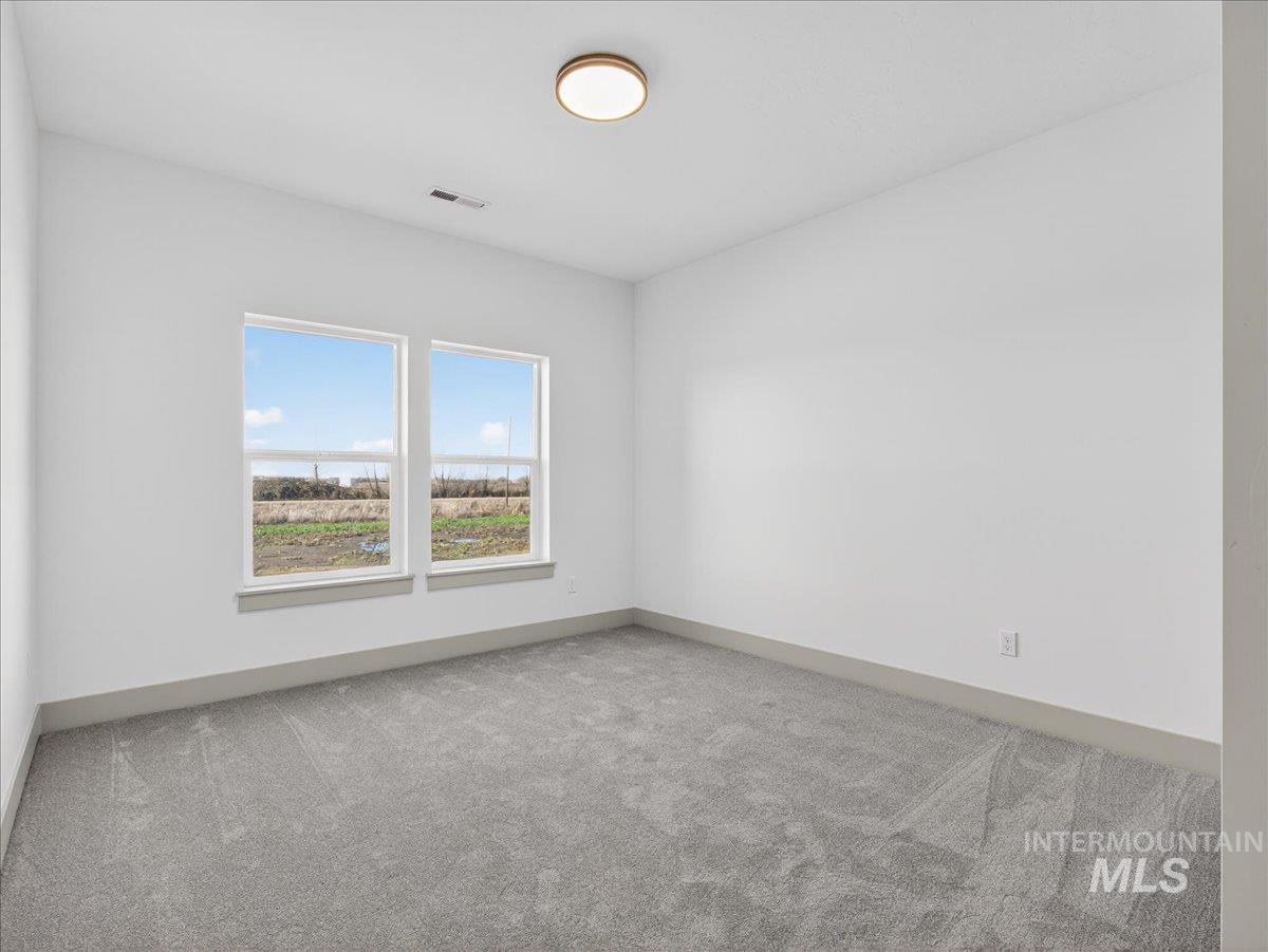 2240 Little Rock Road Emmett, ID 83617 - Photo 41 of 50 Carpeted spare room with baseboards