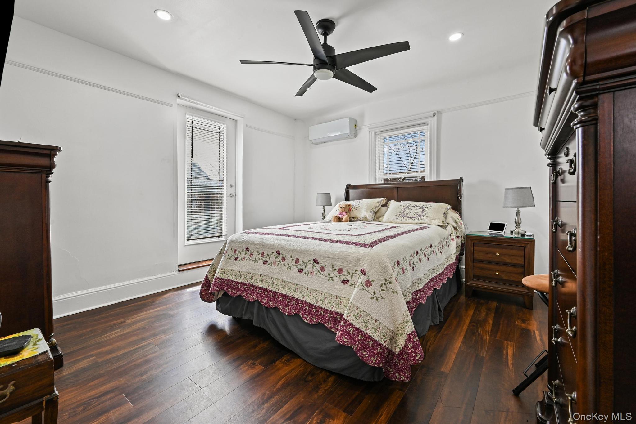 6 Dubonnet Road Valley Stream, NY 11581 - Photo 11 of 27 Bedroom featuring a ceiling fan, recessed lighting, and access to exterior sitting space