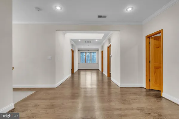 a view of hallway with livingroom
