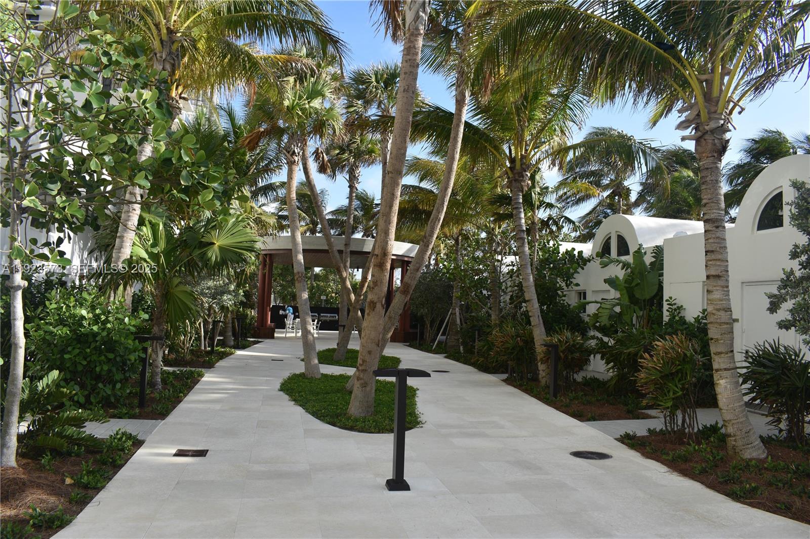 6365 Collins Avenue, Unit 3804 Miami Beach, FL 33141 - Photo 2 of 33 a view of a fountain in front of house