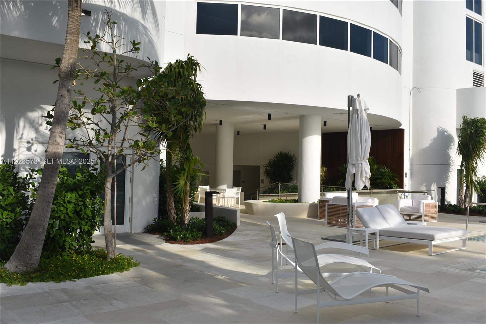 6365 Collins Avenue, Unit 3804 Miami Beach, FL 33141 - Photo 5 of 33 a view of a building with sitting area