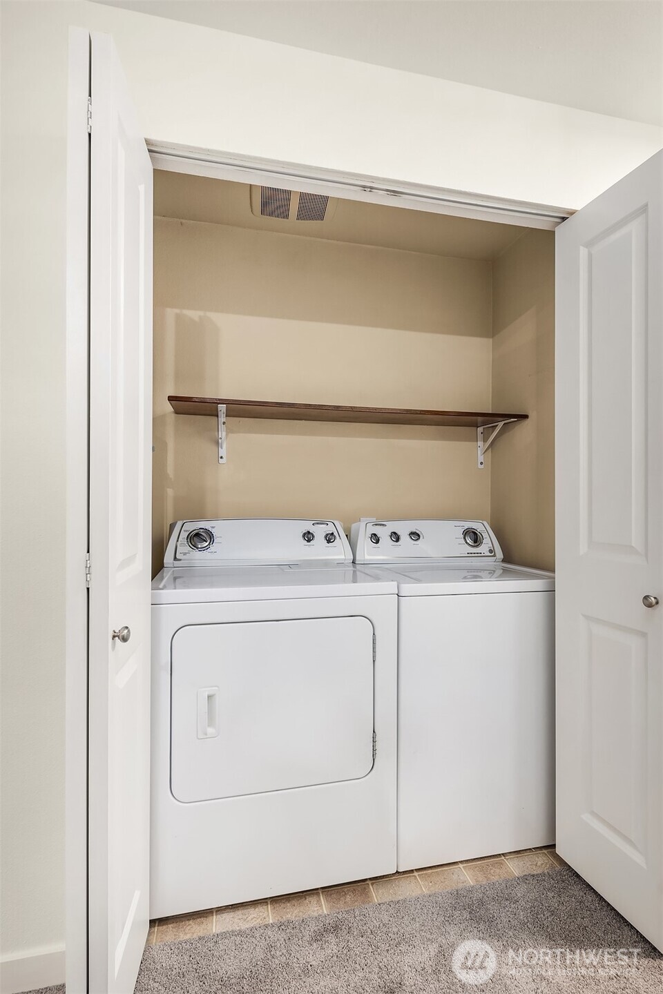 7711 Northeast 175th Street, Unit B210 Kenmore, WA 98028 - Photo 24 of 25 a utility room with dryer and washer