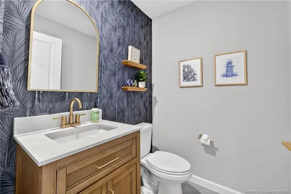a bathroom with a sink and a toilet