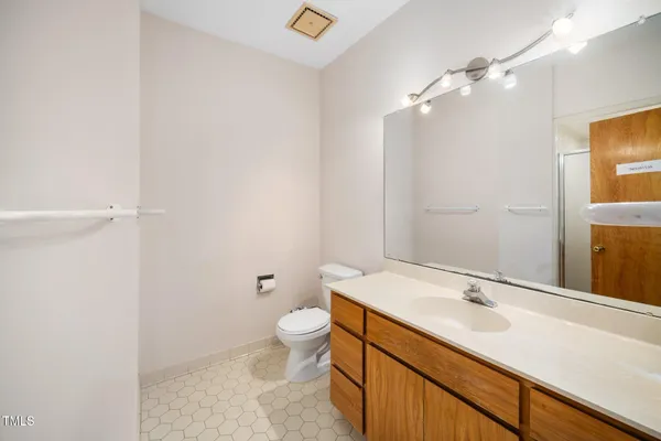 a utility room with sink dryer and washer