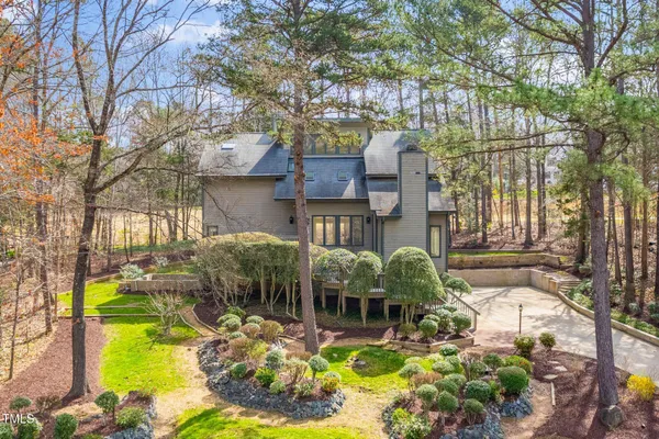 a swimming pool view with a outdoor seating