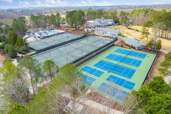 an aerial view of a house with a lake view
