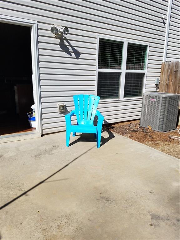 240 Ridge Mill Drive Acworth, GA 30102 - Photo 18 of 22 a house with a yard and parking space
