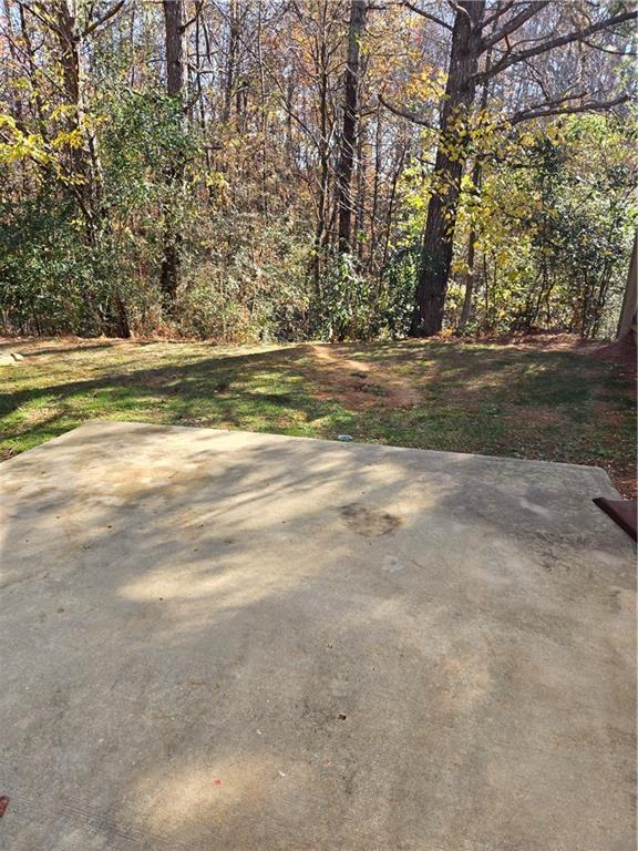 240 Ridge Mill Drive Acworth, GA 30102 - Photo 22 of 22 a view of a field of grass and trees