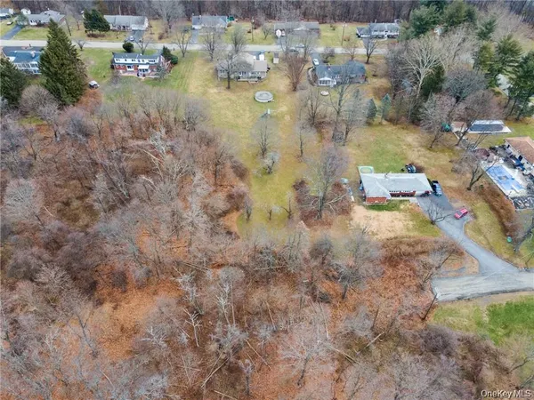 a aerial view of residential houses with outdoor space