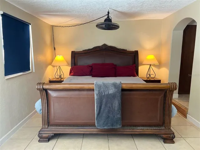 a view of a storage and utility room with a washer dryer