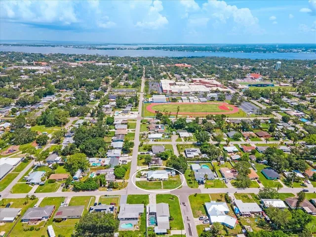 a view of a backyard with a sitting area