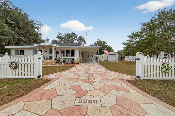a view of a house with a patio