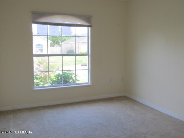 3488 Alec Drive Middleburg, FL 32068 - Photo 18 of 24 an empty room with a window