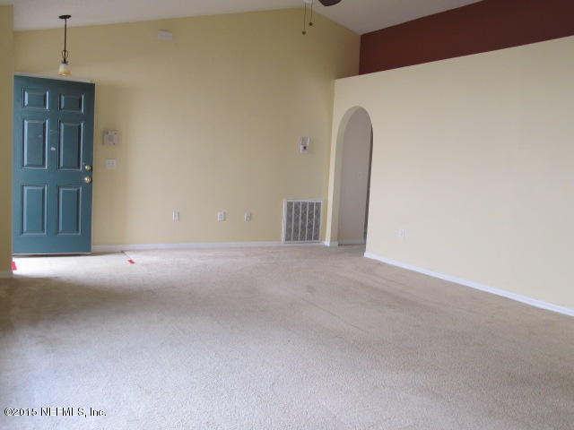 3488 Alec Drive Middleburg, FL 32068 - Photo 5 of 24 a view of a room with a door and a ceiling fan