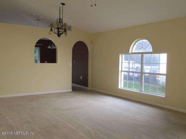 3488 Alec Drive Middleburg, FL 32068 - Photo 8 of 24 a view of an empty room with a window