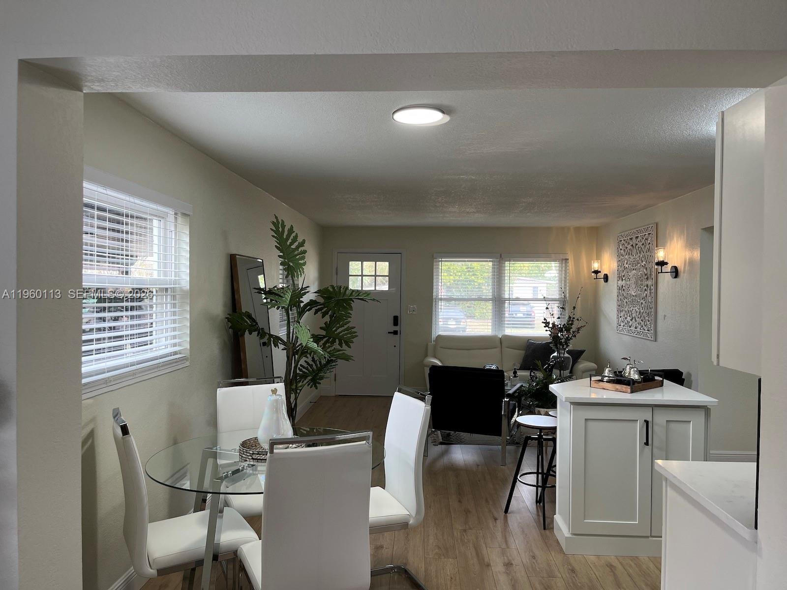 2253 Dordon Drive Melbourne, FL 32935 - Photo 25 of 40 a dining room with furniture and window