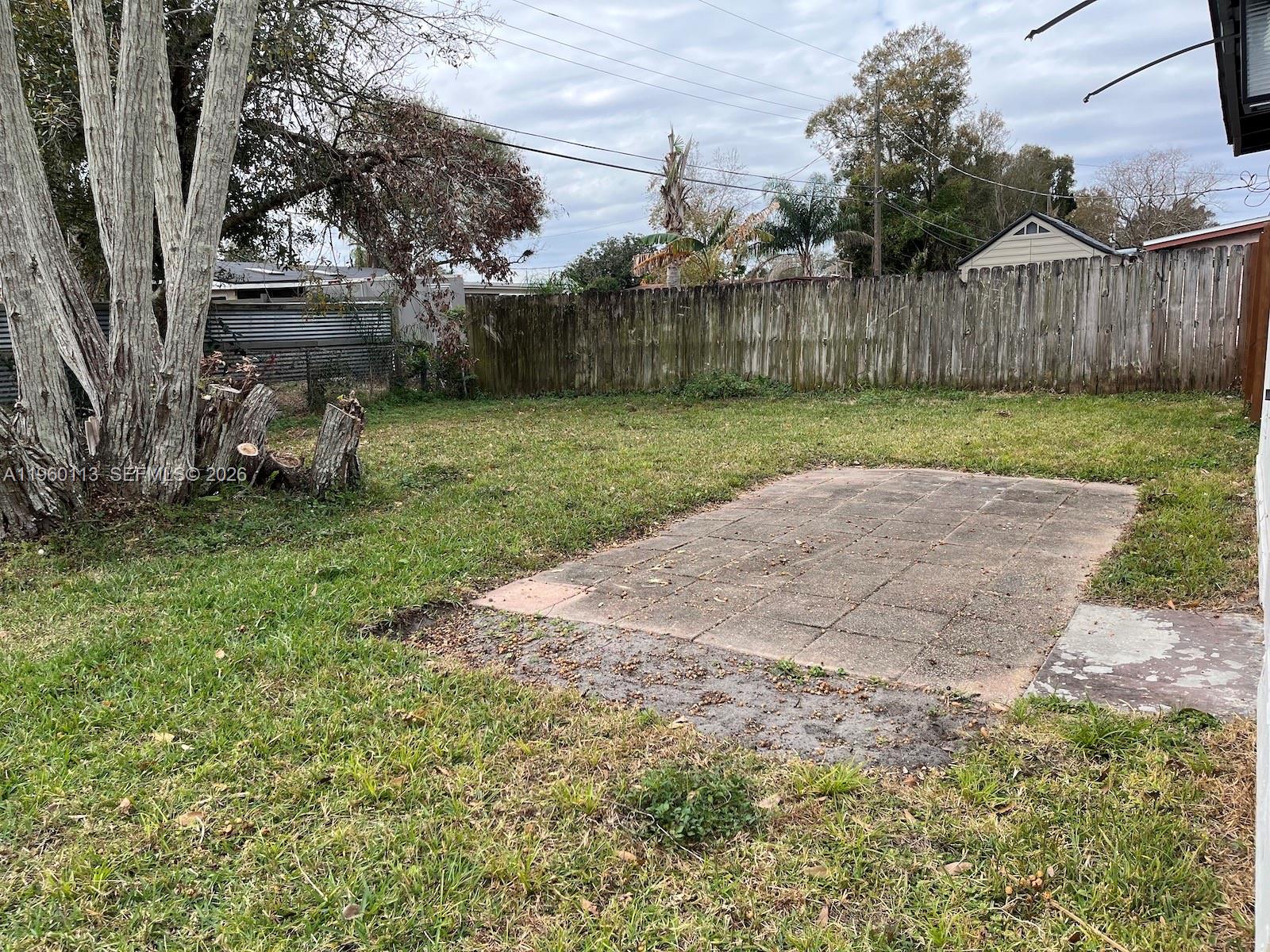 2253 Dordon Drive Melbourne, FL 32935 - Photo 35 of 40 a view of backyard with green space