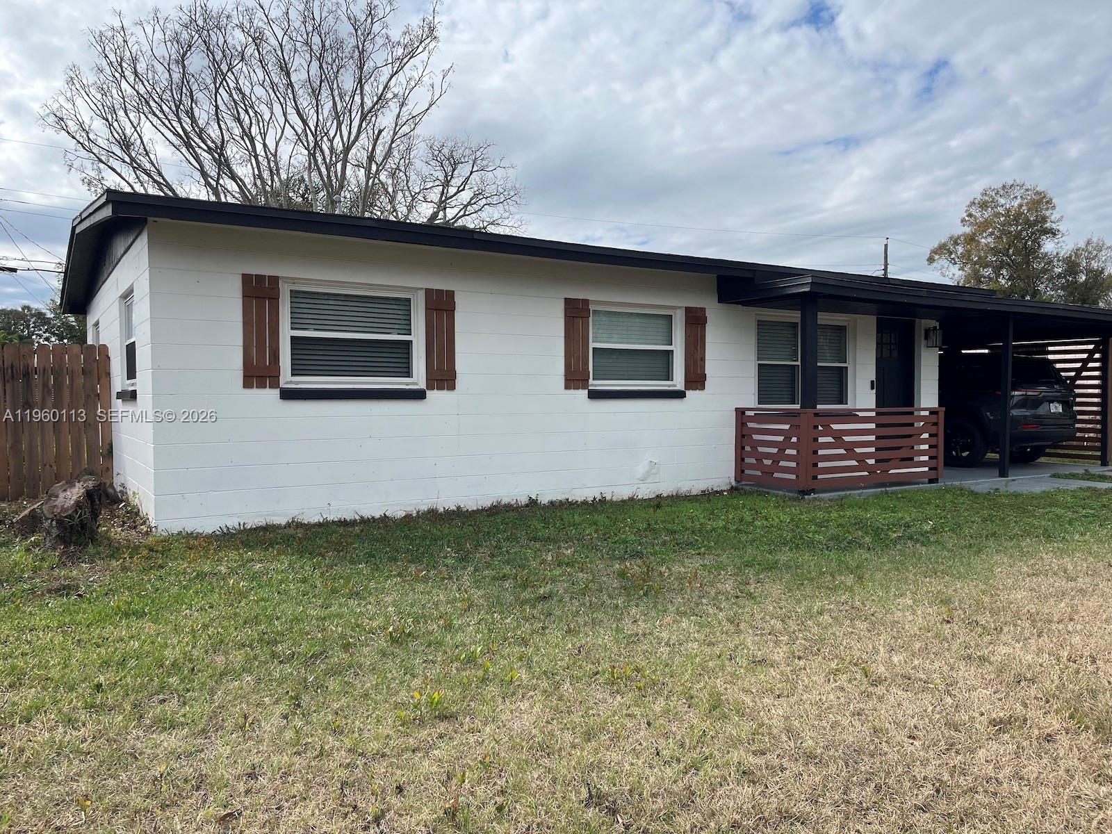2253 Dordon Drive Melbourne, FL 32935 - Photo 4 of 40 a front view of house with yard