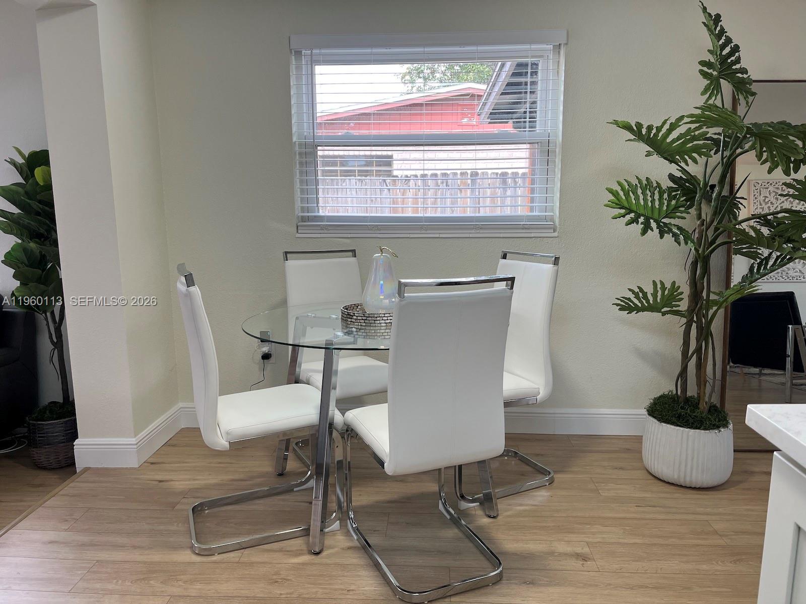 2253 Dordon Drive Melbourne, FL 32935 - Photo 9 of 40 a view of a livingroom with furniture and a potted plant
