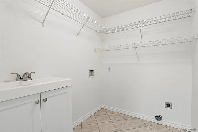 a bathroom with a sink and vanity