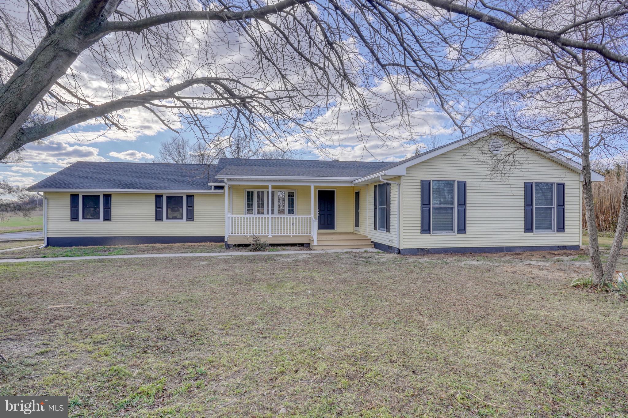 1804 Hourglass Road Hartly, DE 19953 - Photo 1 of 46 a view of a yard in front of a house with large tree