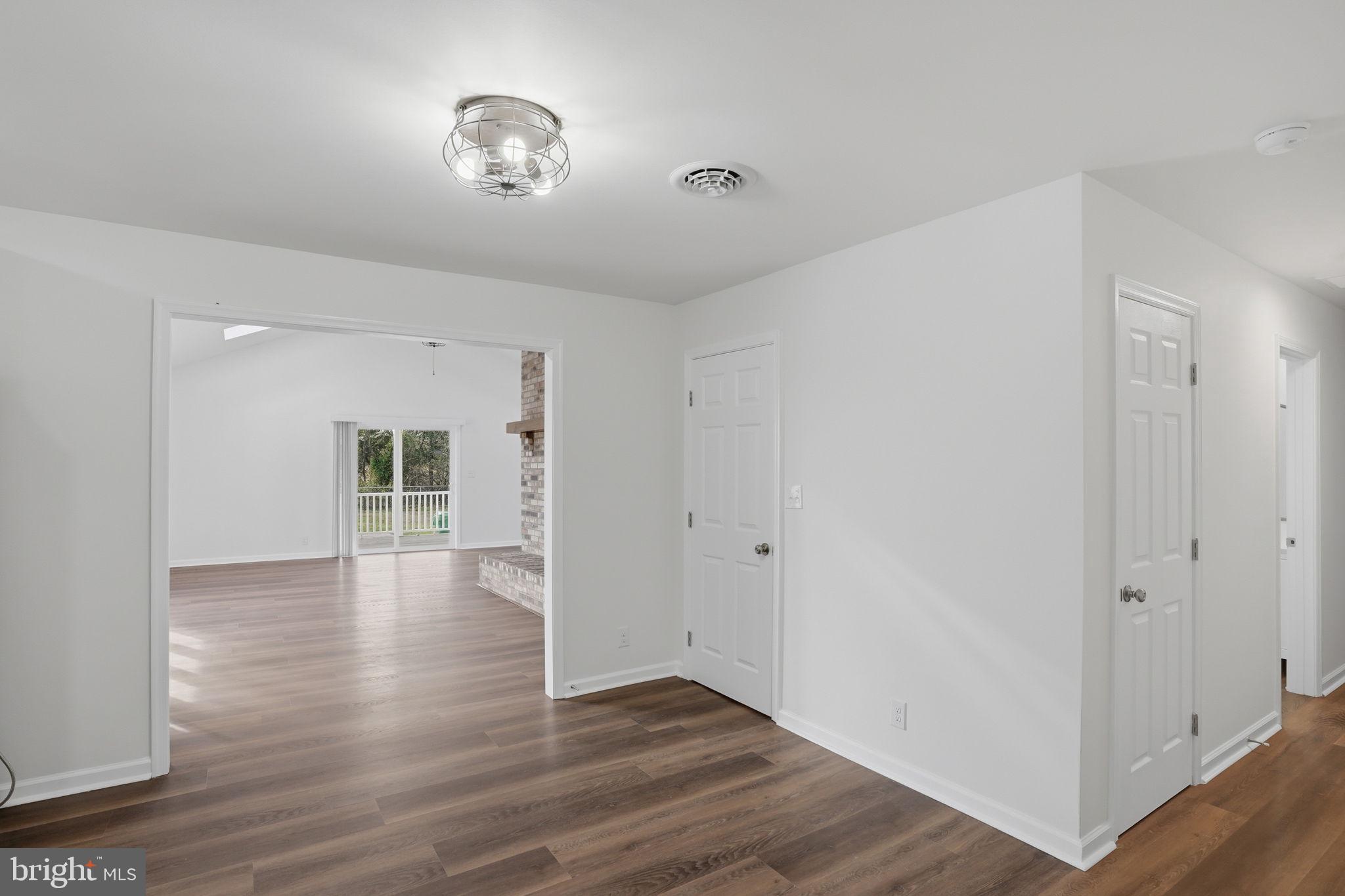 1804 Hourglass Road Hartly, DE 19953 - Photo 11 of 46 a view of livingroom with hardwood floor and a ceiling fan