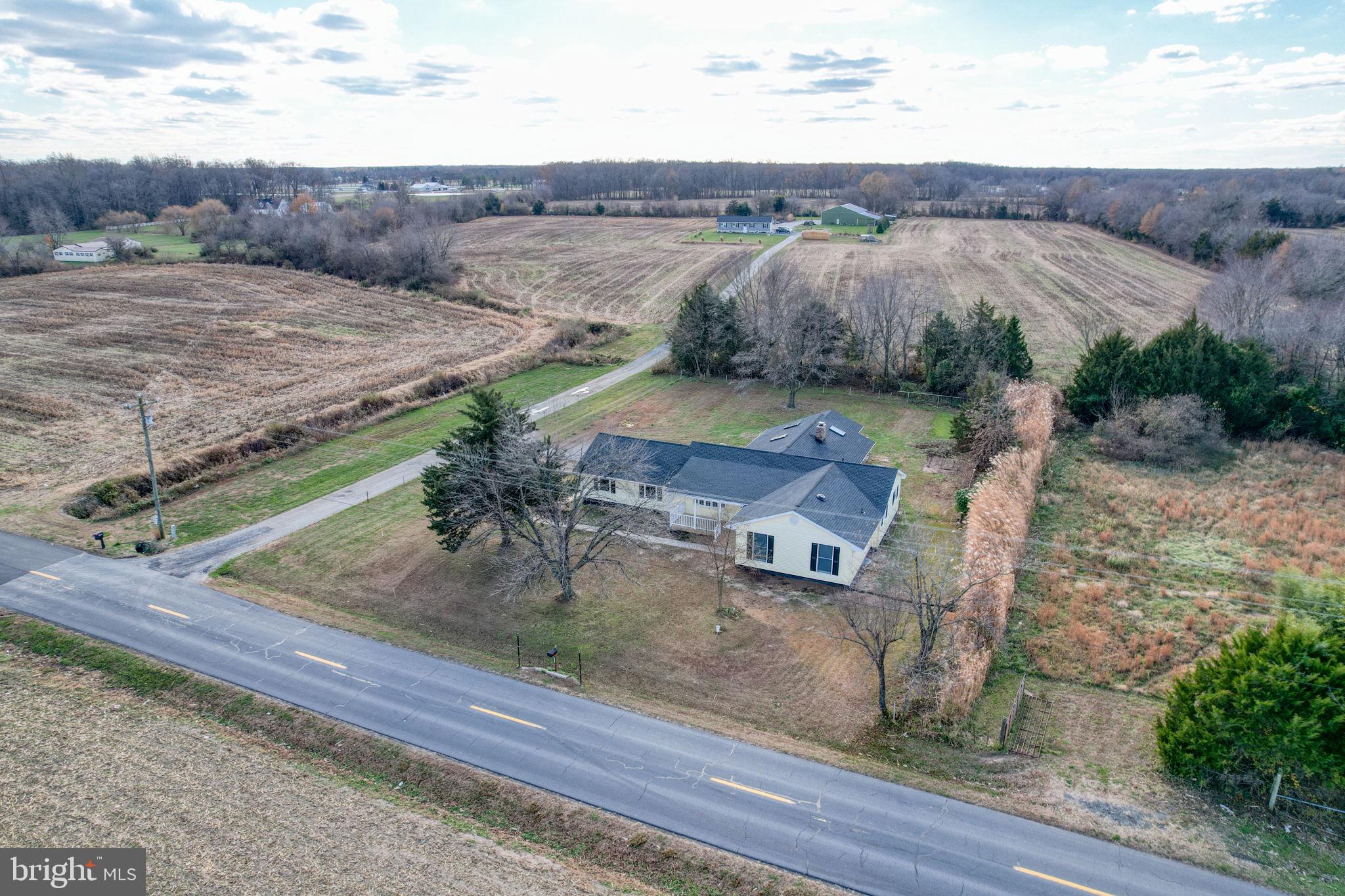 1804 Hourglass Road Hartly, DE 19953 - Photo 2 of 46 a view of a backyard with outdoor space