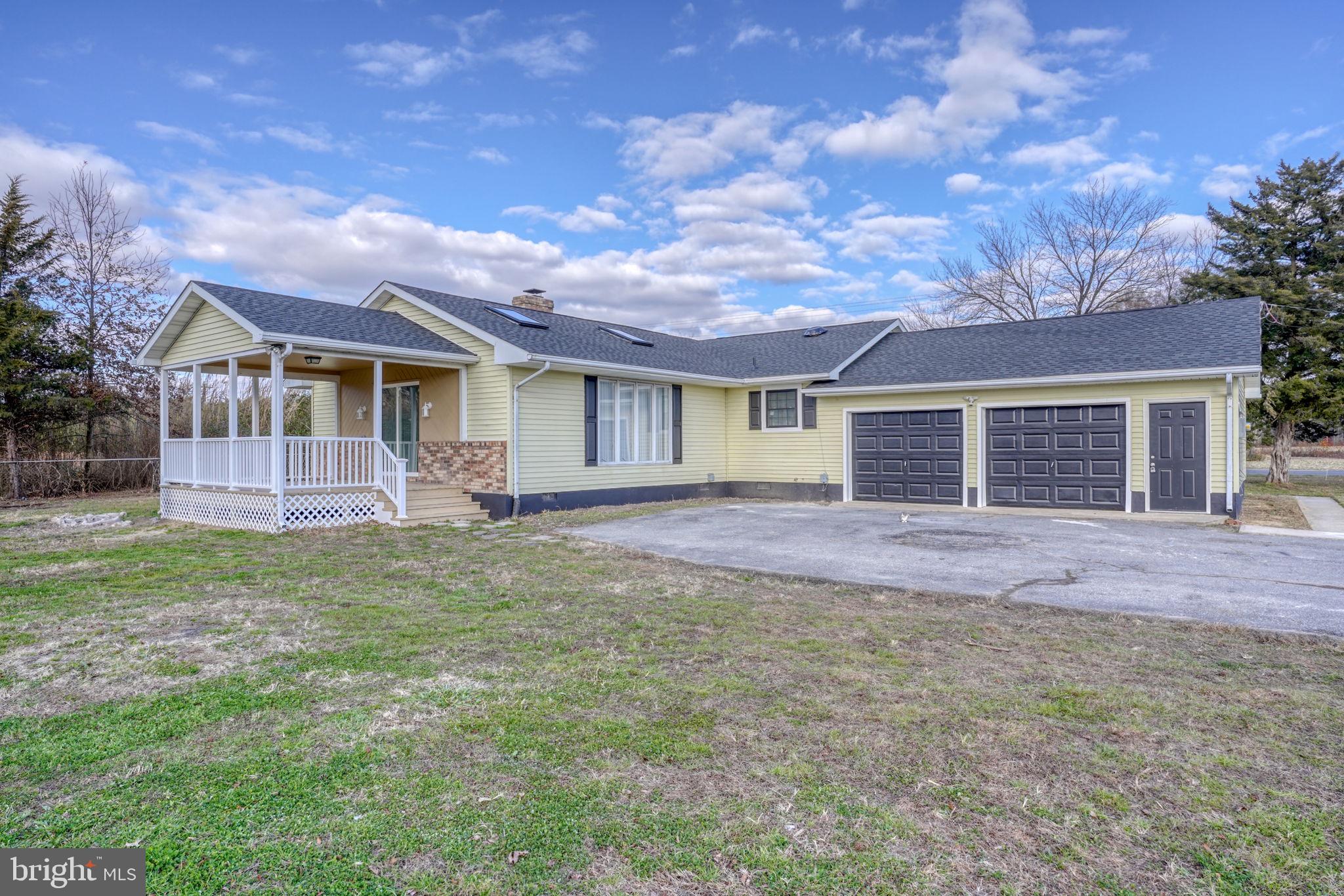 1804 Hourglass Road Hartly, DE 19953 - Photo 41 of 46 front view of a house with a yard