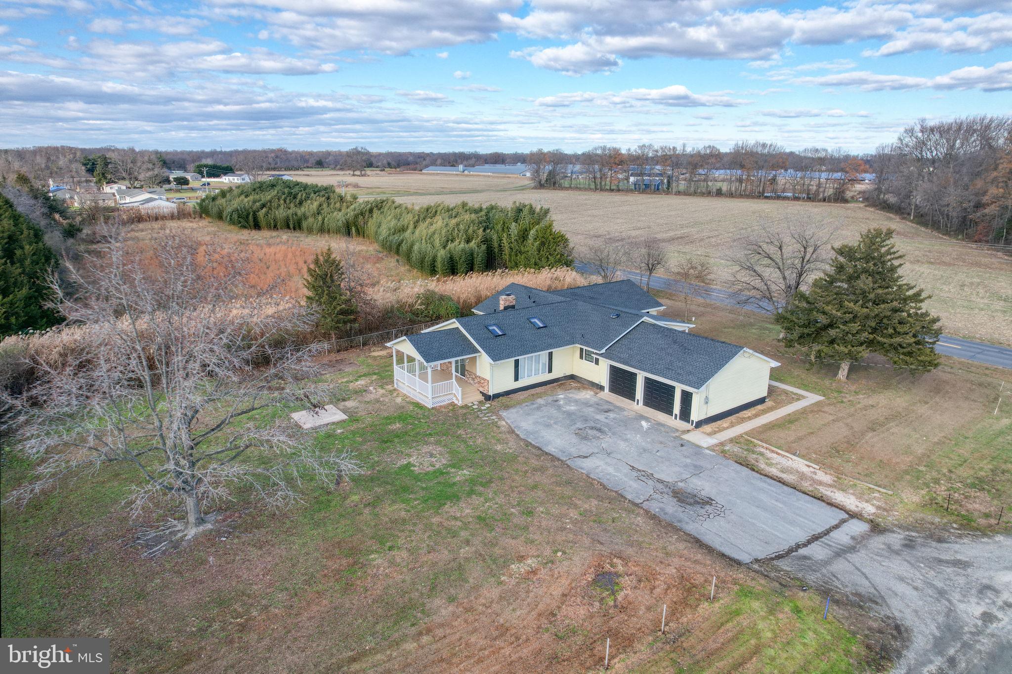 1804 Hourglass Road Hartly, DE 19953 - Photo 45 of 46 an aerial view of a house with a yard and lake view