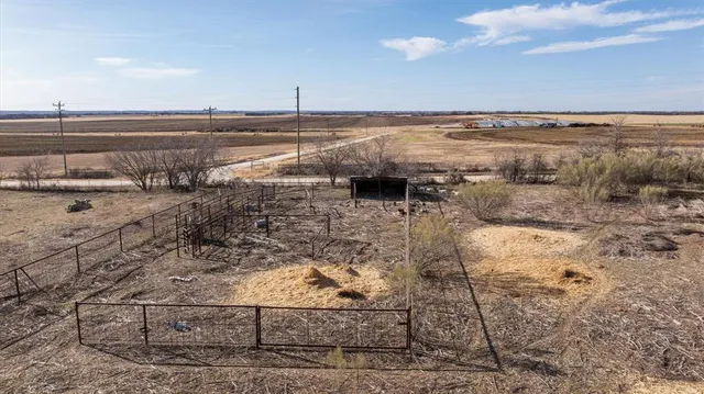 a view of a water with an ocean beach