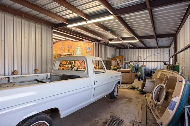 a building outdoor space with patio furniture and outdoor kitchen