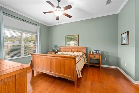 a bed room with a bed and a window