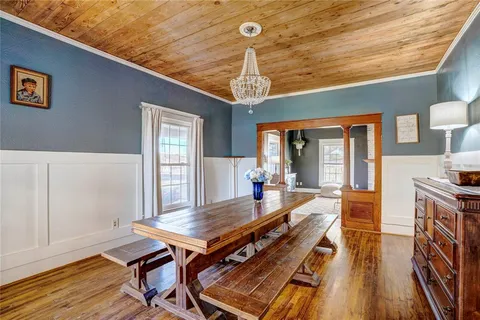 a outdoor space with wooden furniture