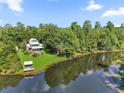 $775,000 | 203 John Henry Lake Road, Poplarville, MS 39470