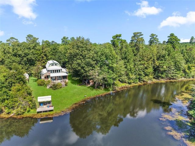 $775,000 | 203 John Henry Lake Road, Poplarville, MS 39470