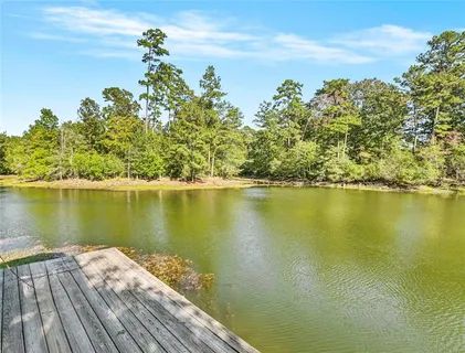 $775,000 | 203 John Henry Lake Road, Poplarville, MS 39470