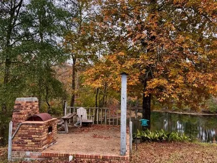 $775,000 | 203 John Henry Lake Road, Poplarville, MS 39470