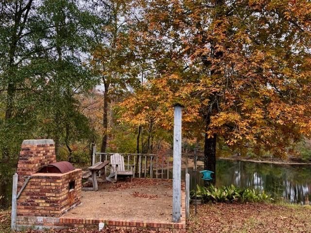 $775,000 | 203 John Henry Lake Road, Poplarville, MS 39470