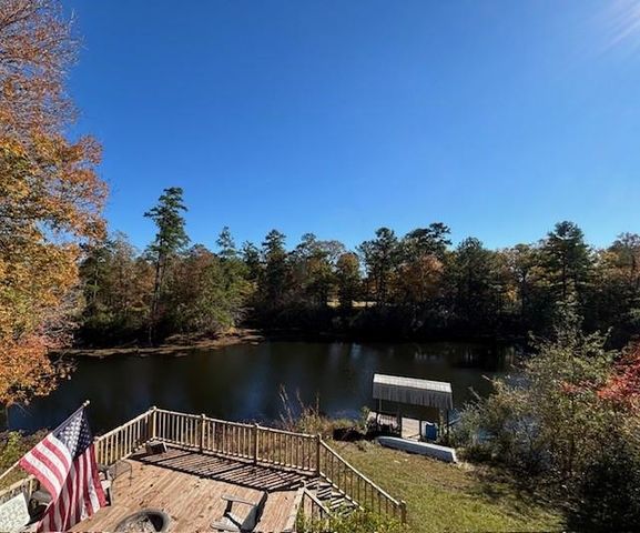 $775,000 | 203 John Henry Lake Road, Poplarville, MS 39470