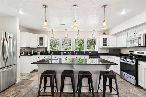 $775,000 | 203 John Henry Lake Road, Poplarville, MS 39470