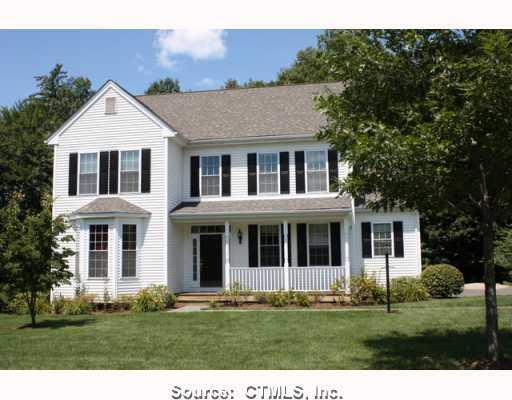 48 Buckingham Road Avon, CT 06001 - Photo 1 of 1 a front view of a house with a garden