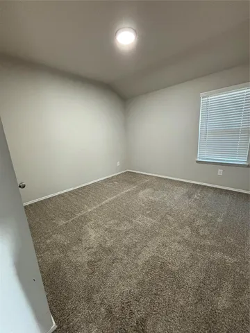 an empty room with a natural light