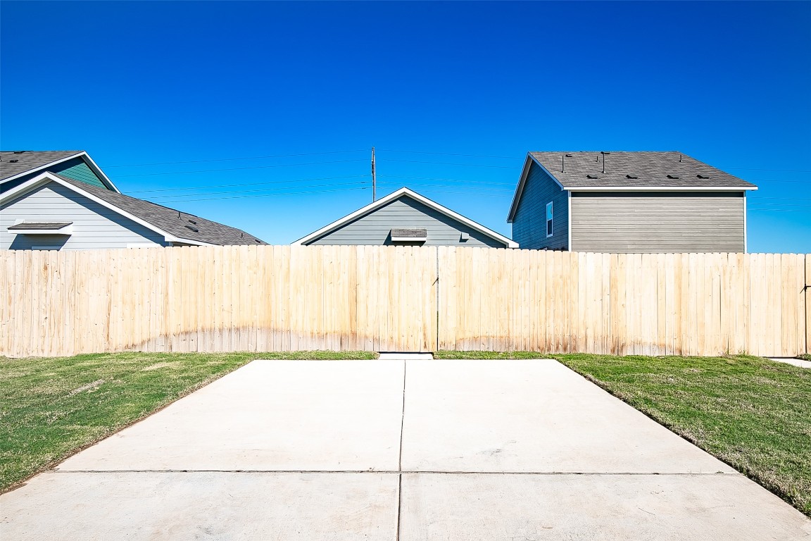 1133 Largemouth Road Bastrop, TX 78602 - Photo 16 of 16 a house view with a garden space