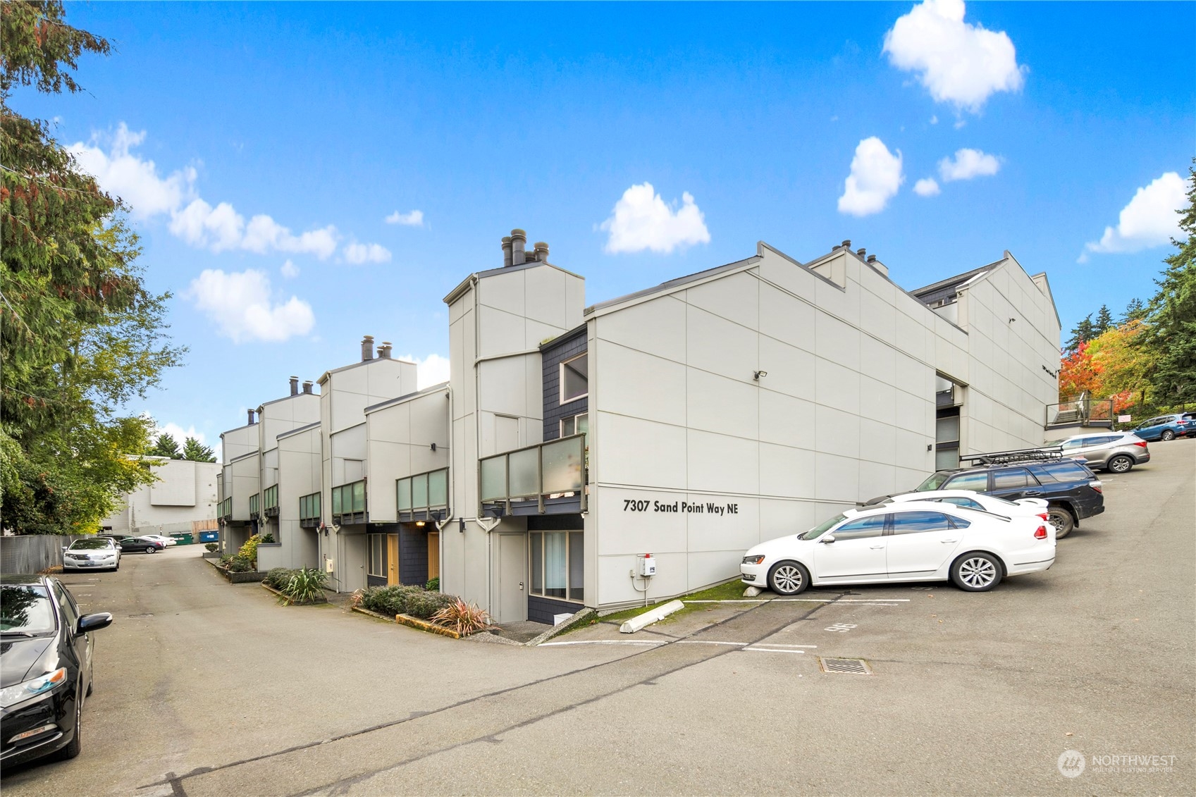 a view of a cars park in front of house