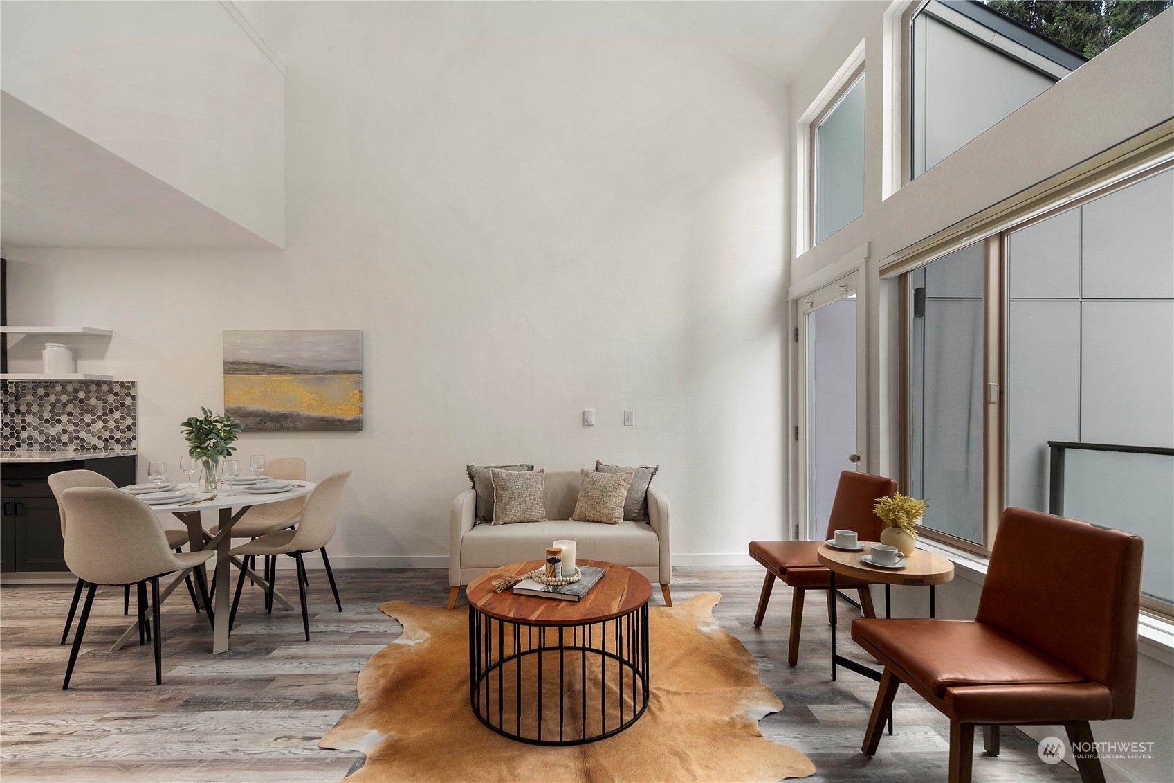 7307 Sand Point Way Northeast, Unit B618 Seattle, WA 98115 - Photo 14 of 23 a living room with furniture a rug and a window