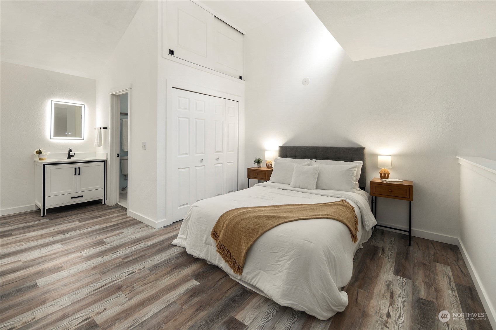 7307 Sand Point Way Northeast, Unit B618 Seattle, WA 98115 - Photo 17 of 23 a bedroom with a bed and a table